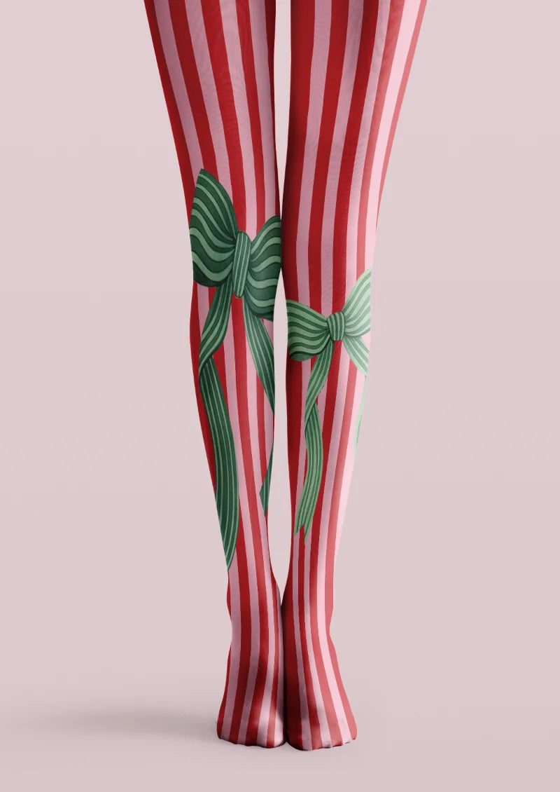 Red and pink vertically striped printed tights with large green bows and long striped ribbon tails.
