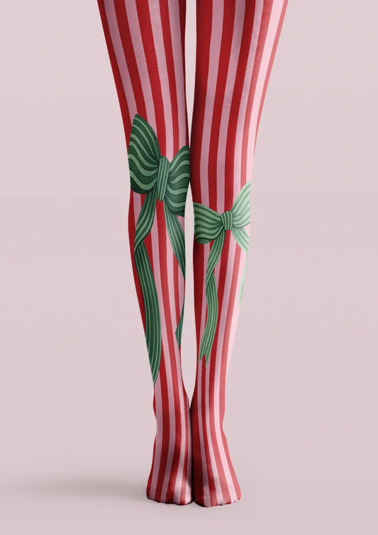 Red and pink vertically striped printed tights with large green bows and long striped ribbon tails.
