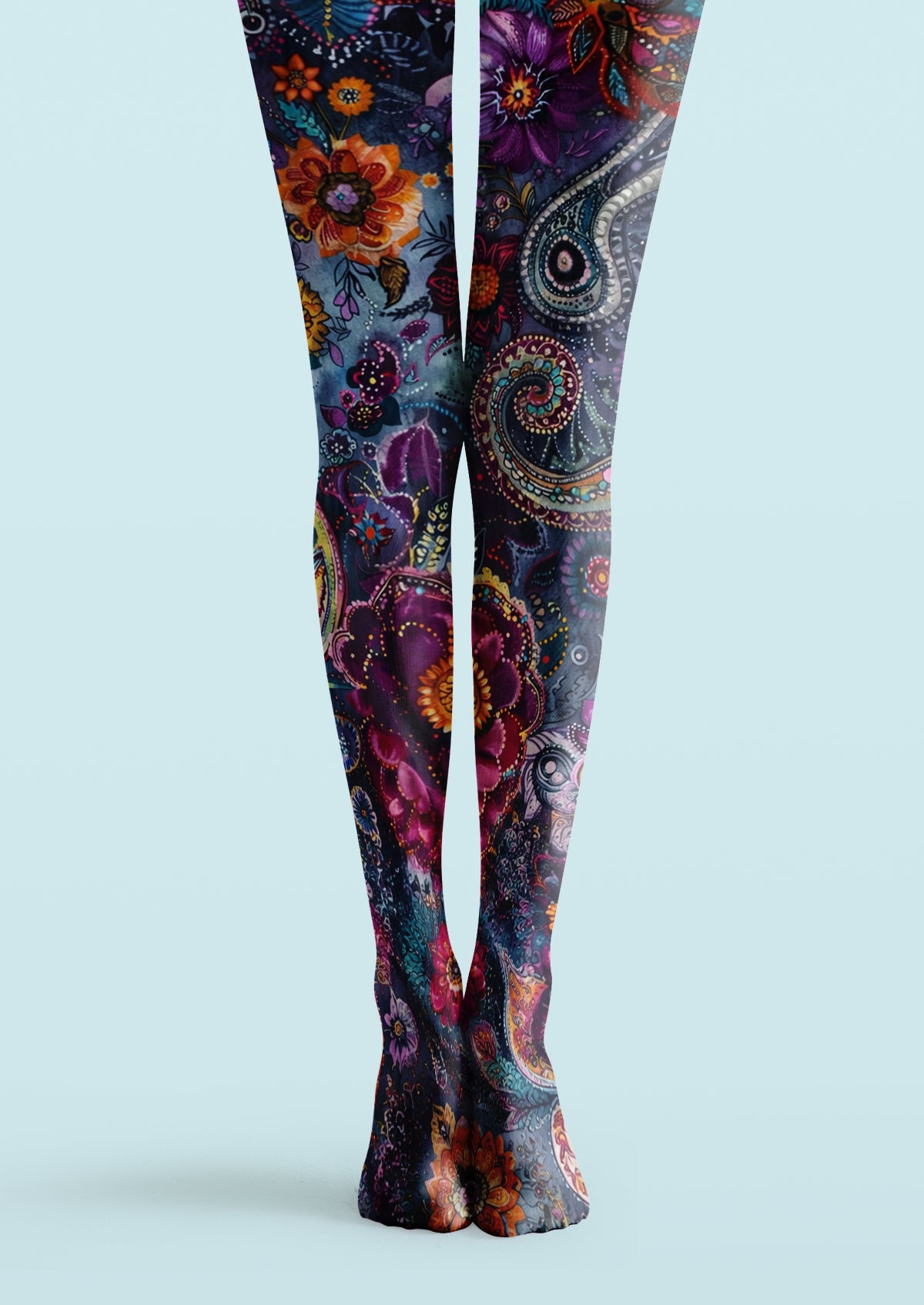 Purple blue printed tights decorated with mixed floral blooms and swirling paisley novelty patterns from thigh to toe
