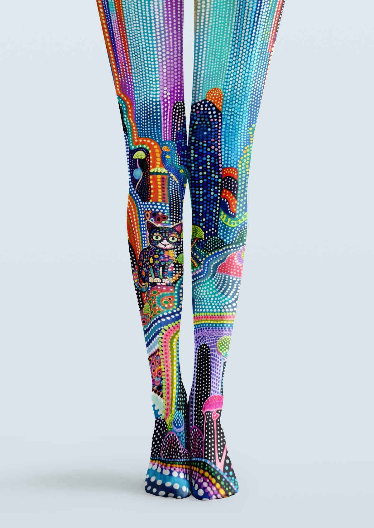 Multicolor printed tights with pointillist dots, abstract landscape shapes and a small cat motif