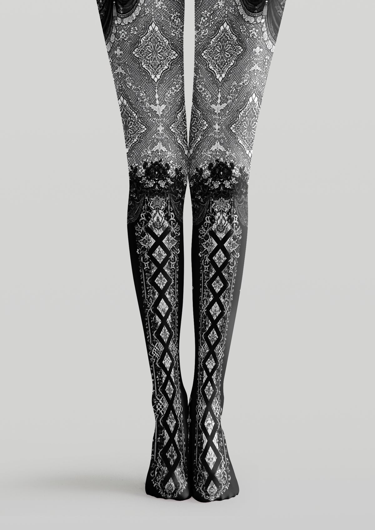 Black and white printed tights with damask floral scrolls and crisscross diamond geometric patterns across legs and feet
