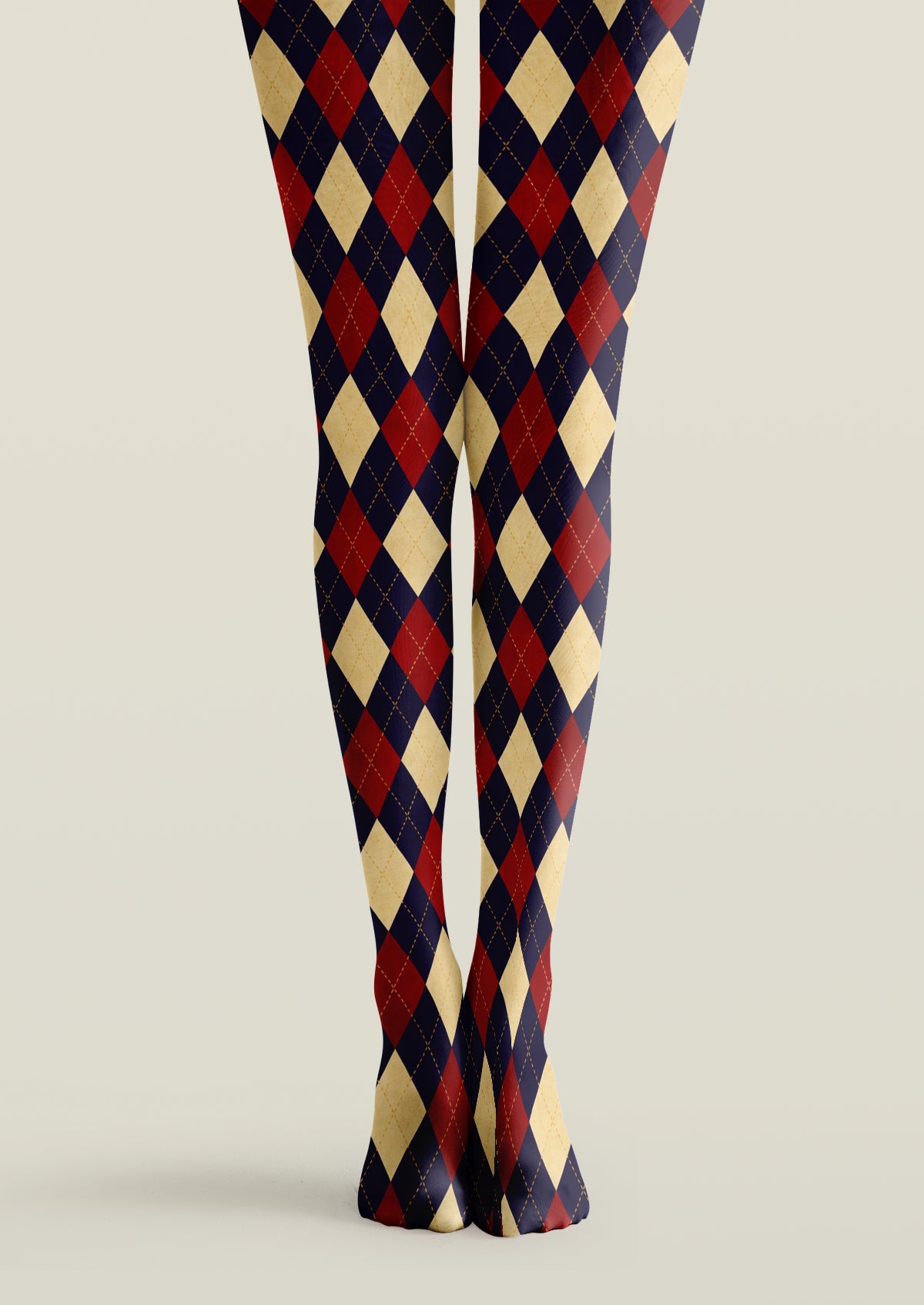 Navy, burgundy and beige printed tights with repeating argyle diamonds and fine dotted diagonal lines across both legs.