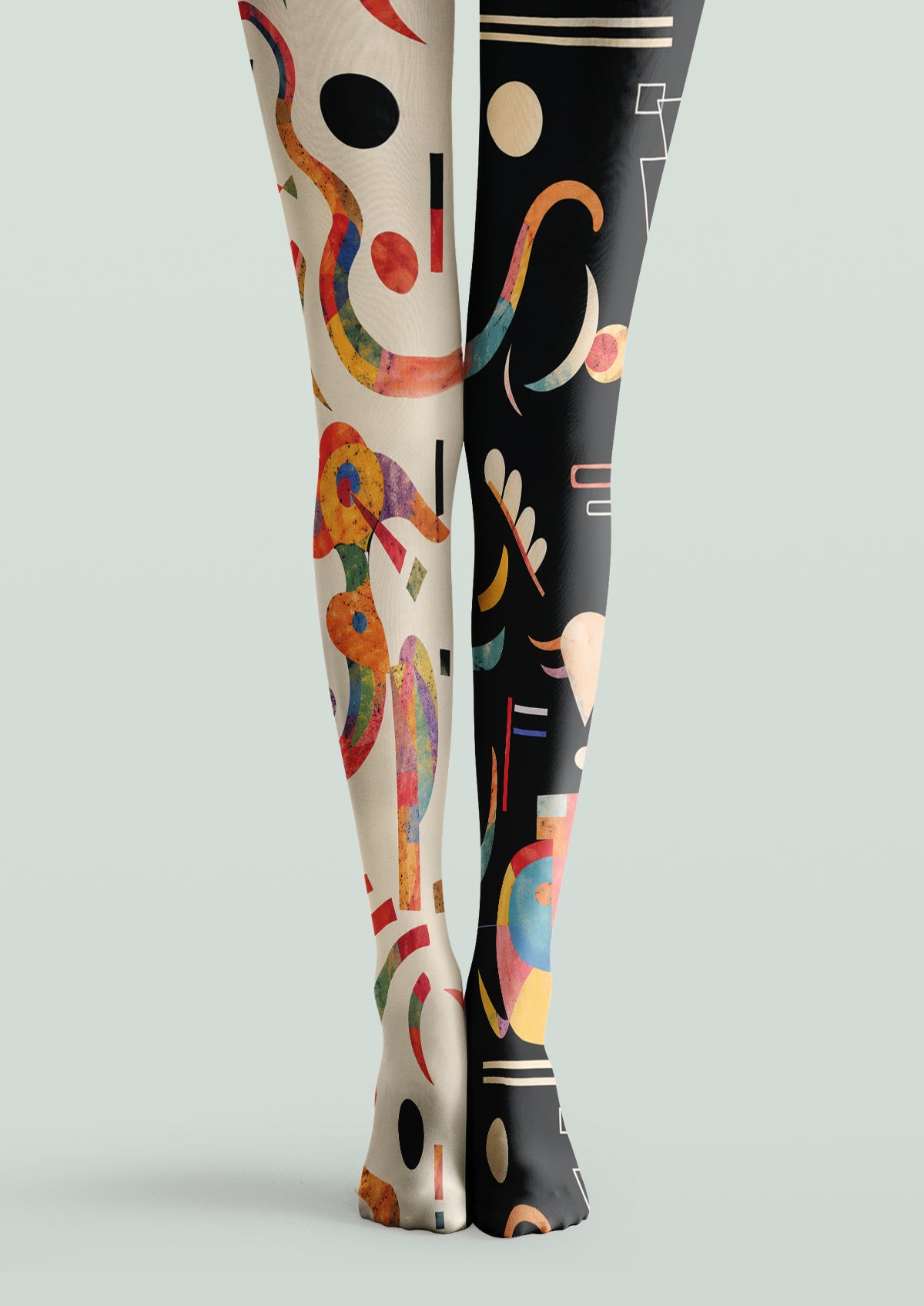 Black and ivory printed tights with Mondrian-inspired colorful abstract geometric shapes and curved lines.