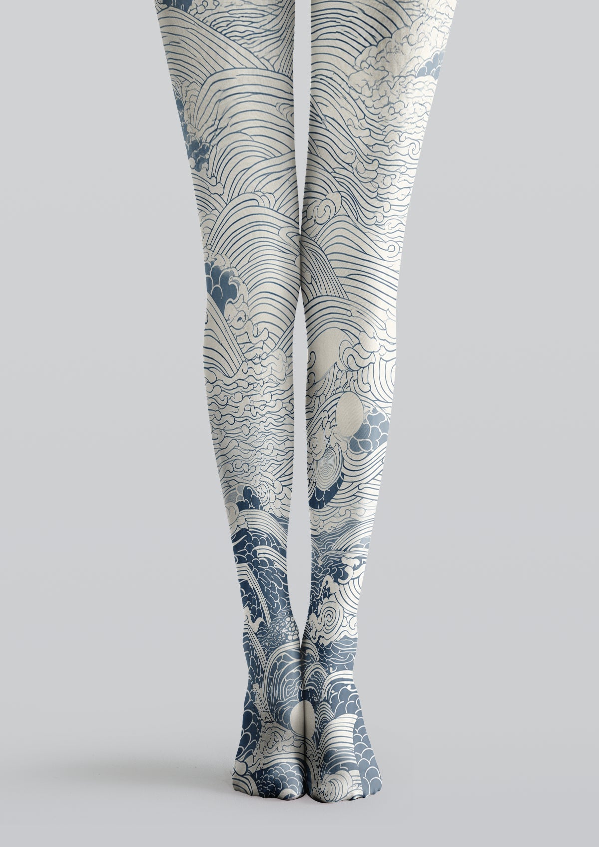 White and blue printed tights featuring Japanese-inspired waves, curling crests and detailed ocean linework.