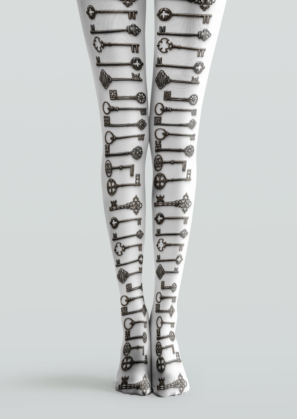 White printed tights with rows of ornate antique-style black and gray key motifs
