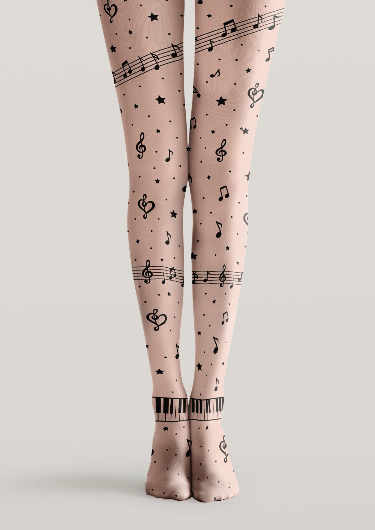 Beige printed tights with black music notes, stars, musical staff lines and piano-key bands