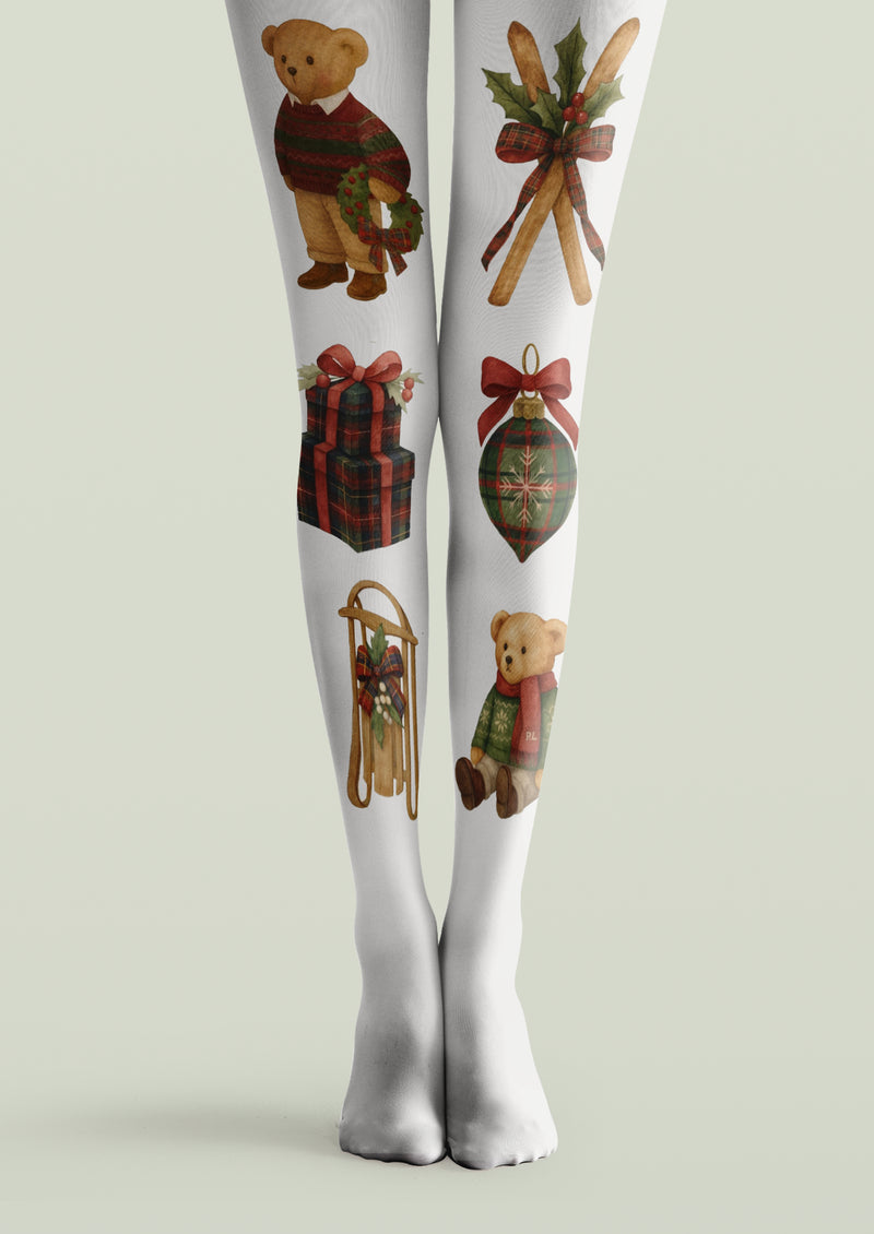 White printed tights with teddy bears, tartan gift boxes, a Christmas ornament and a decorative wooden sled