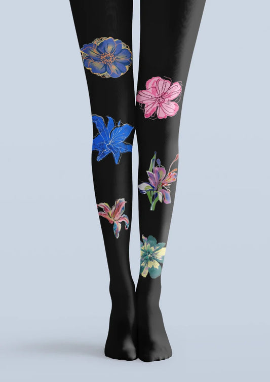 Black tights with large blue, pink and multicoloured flowers spaced asymmetrically across both legs.
