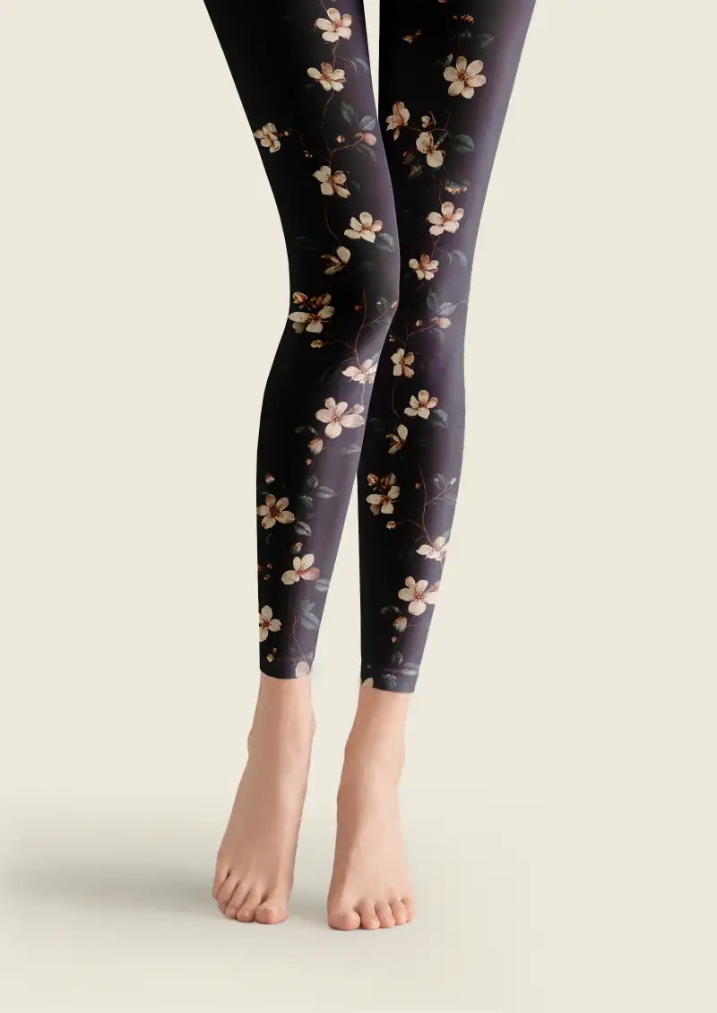 Black footless tights with small floral printed pattern