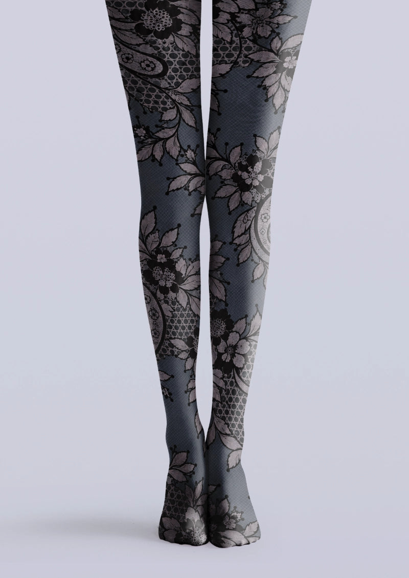 Gray printed tights with muted purple flowers, black scrollwork and circular geometric details
