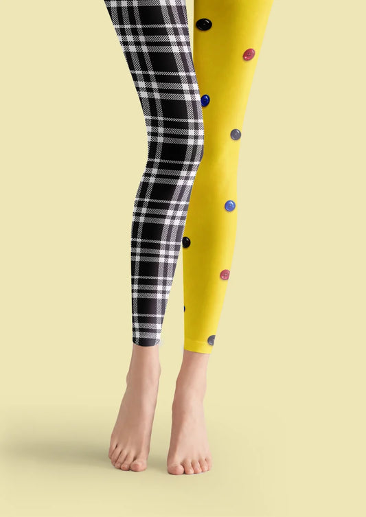 Yellow printed footless tights with black-and-white plaid and colorful button motifs