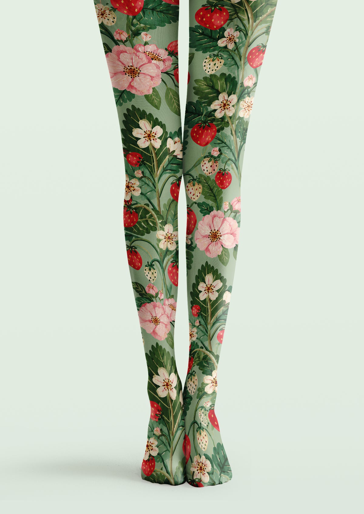 Green printed tights with floral flowers, leaves, and strawberry pattern details.