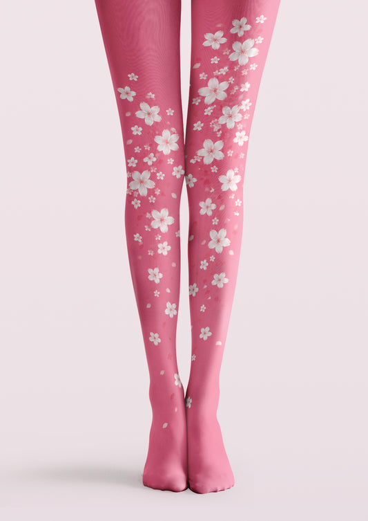 Pink printed tights with white cherry blossom floral pattern details.