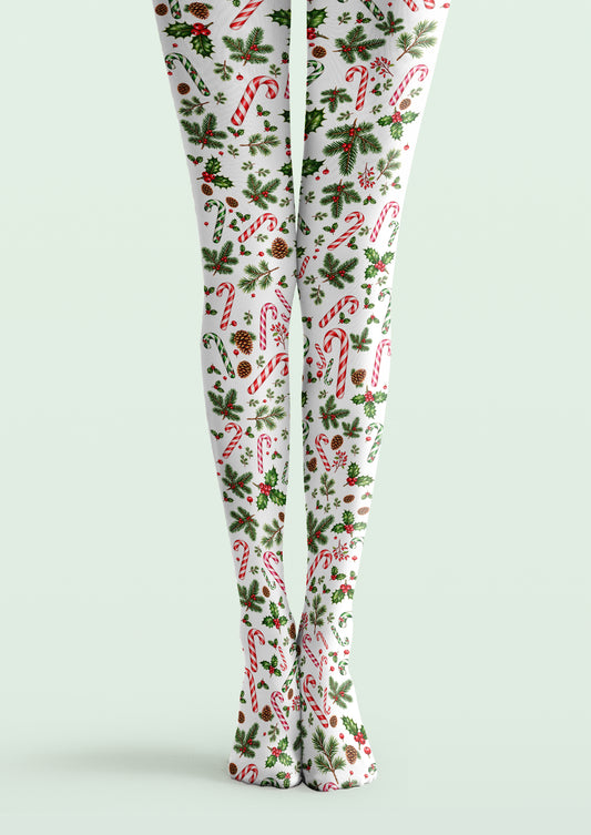 White printed tights with red and green candy canes, holly leaves, berries, pine sprigs, and brown pinecones