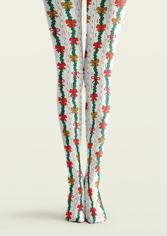 White printed tights with vertical green garlands, red bows, checked and dotted bows, and fine wavy lines