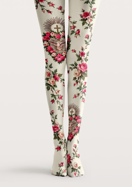 Ivory printed tights with pink roses, green leaves, crosses, and doves framed by floral wreaths