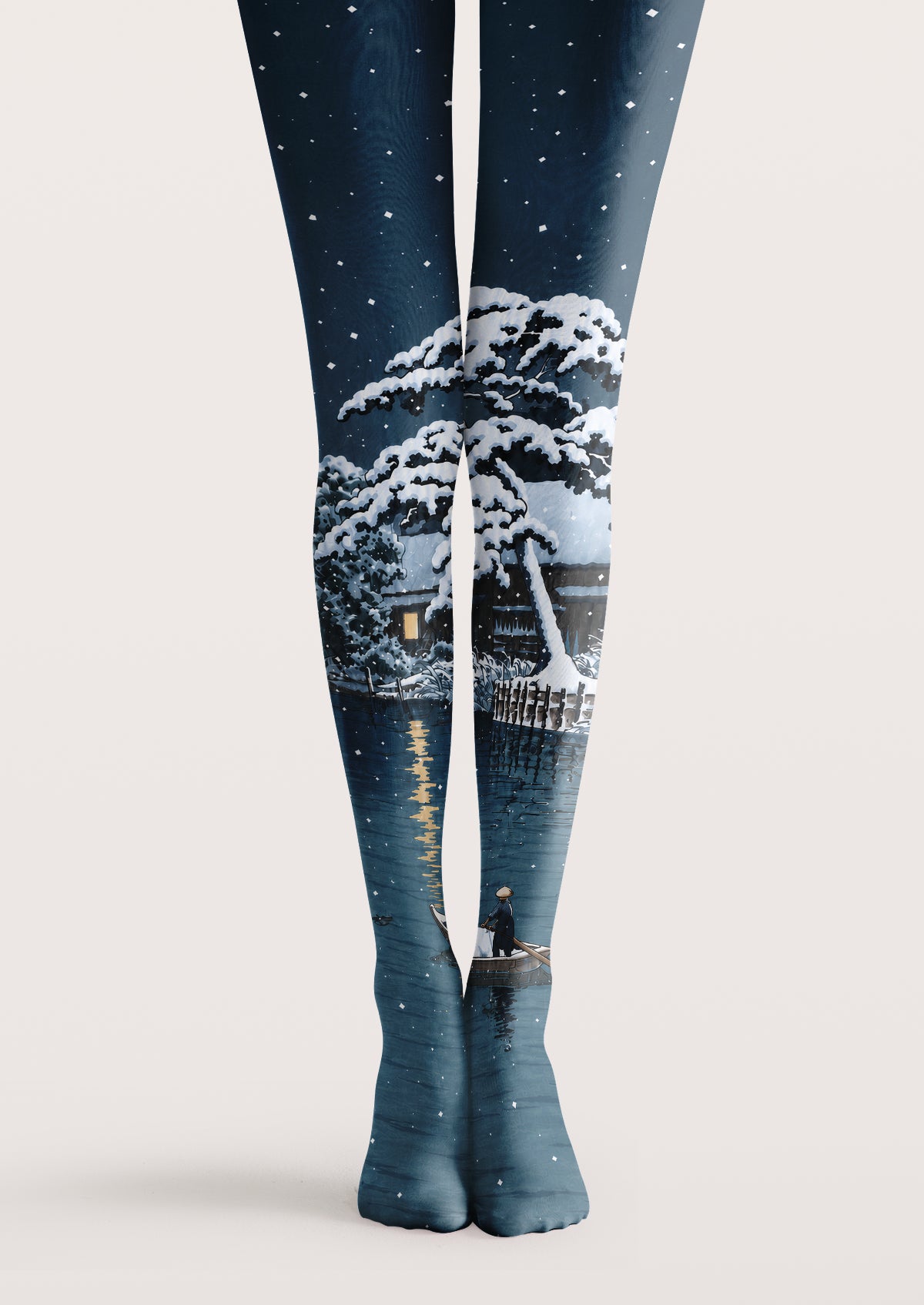 Navy printed tights with snowy winter landscape, trees, lake reflection, and falling snow details.