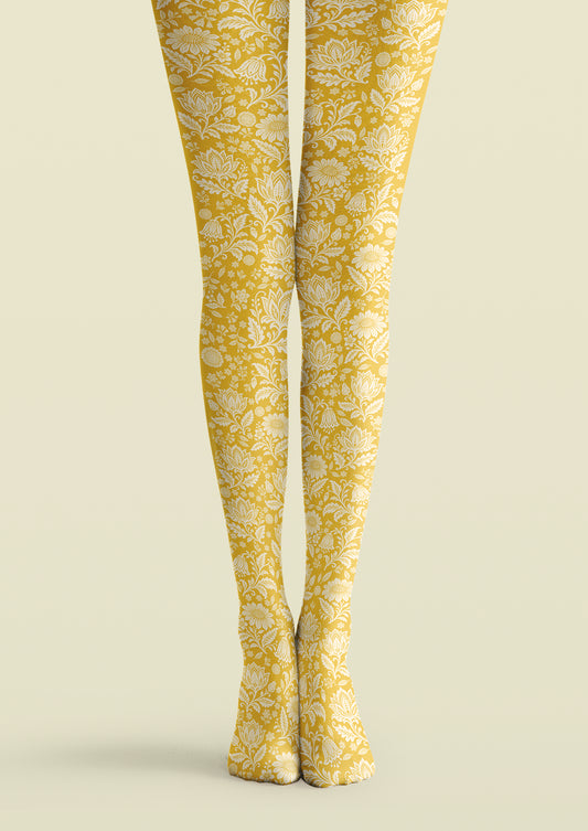 Yellow printed tights with ivory flowers, curling stems, leafy scrolls, and smaller floral sprigs