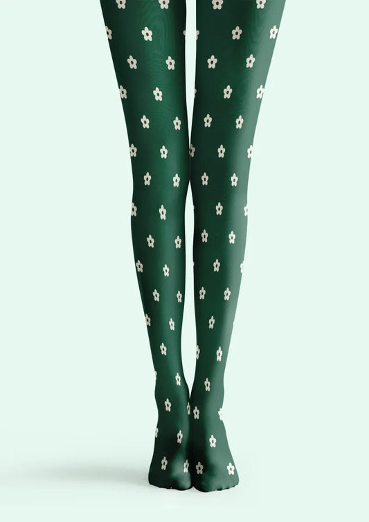 Green printed tights with evenly spaced small white five-petal flowers across both legs
