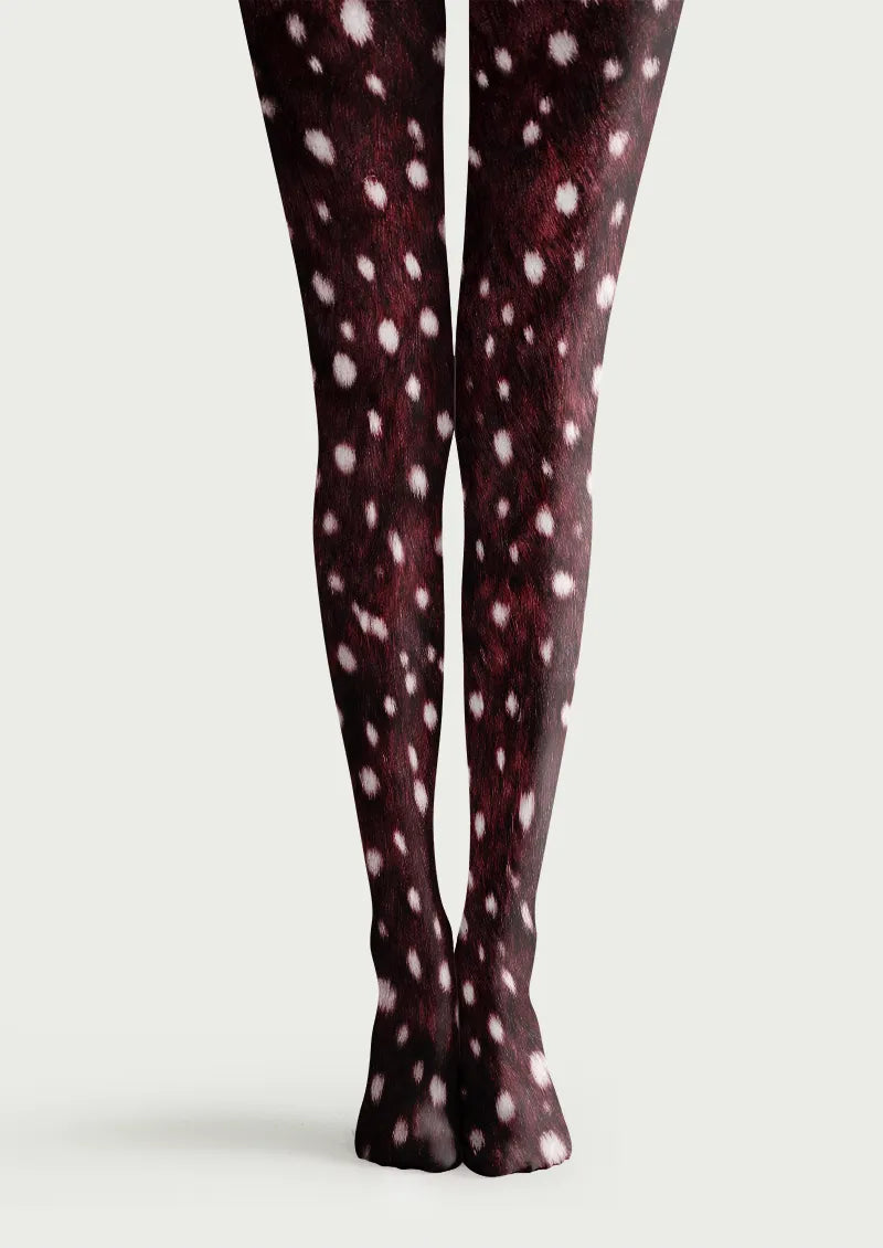 Burgundy printed tights with irregular white fawn-inspired spots across both legs