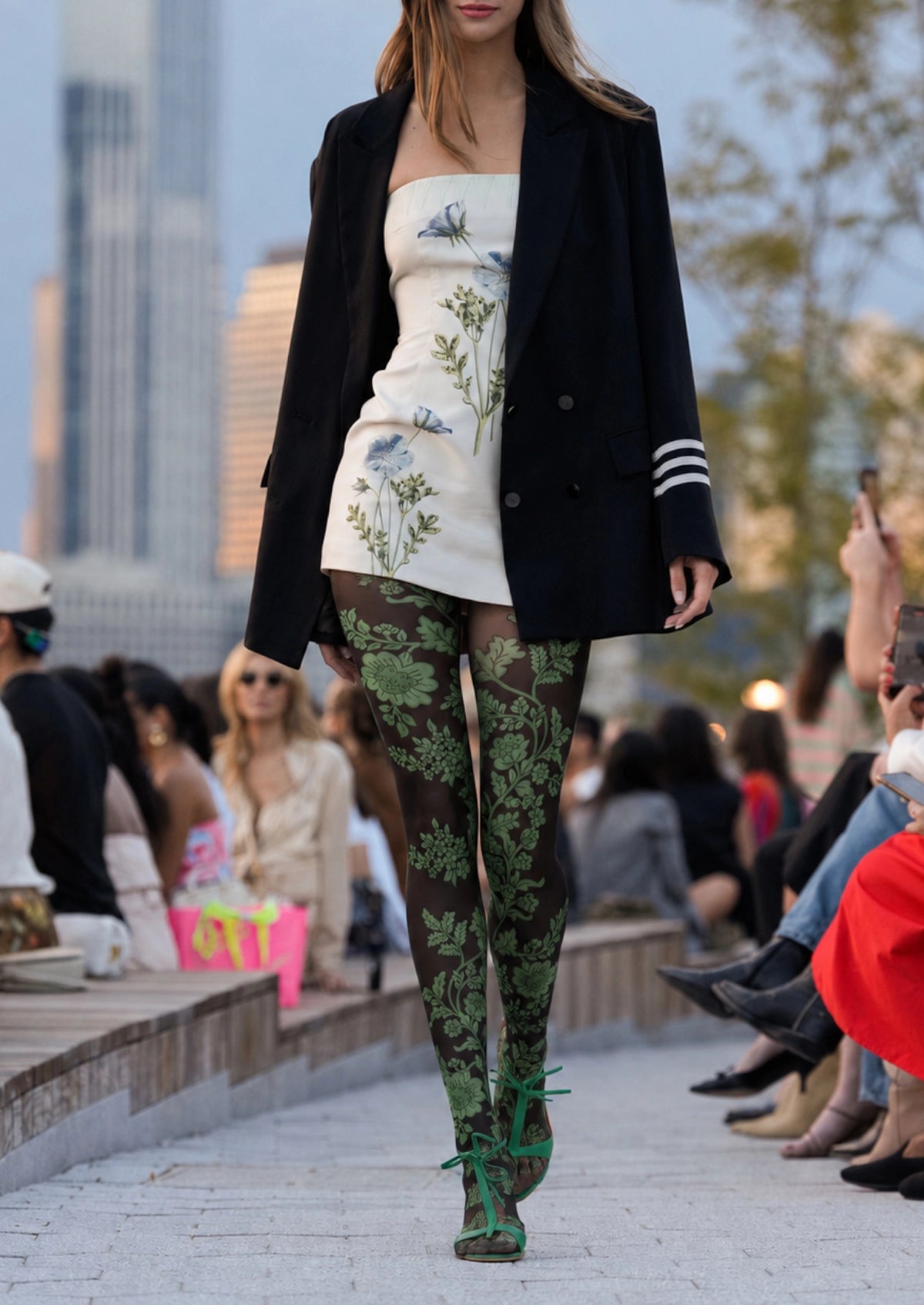 Model wearing Green Botanical Vine Floral Tights in a styled outfit