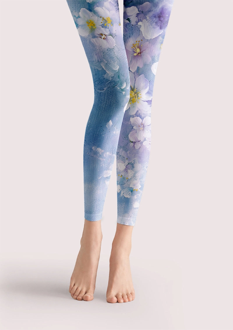 Blue printed footless tights with white and pale purple watercolor flowers and yellow centres